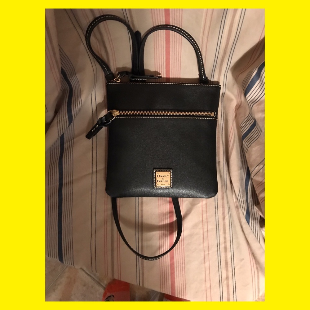 Small black leather Dooney&Bourke crossbody purse.